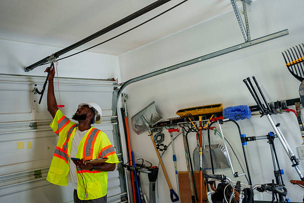 Professional Garage Door Panel Replacement technician working in Meadow Lakes, AK